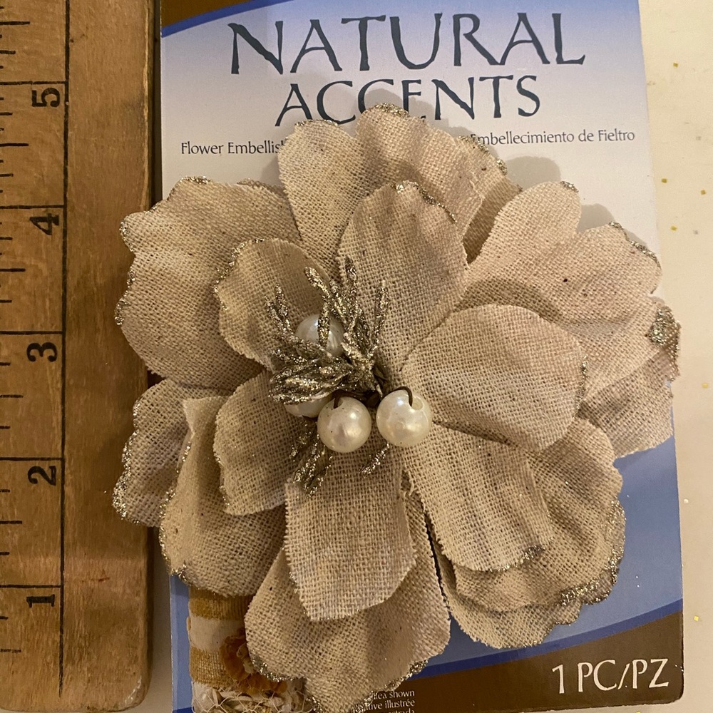 Burlap flower, rolls, and bags. Rolls of jute.